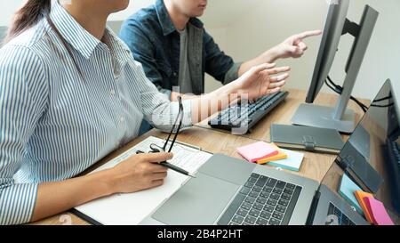 Collaborative work Software engineers website developer technologies or programmer working coding on startup ai application project on screen with par Stock Photo