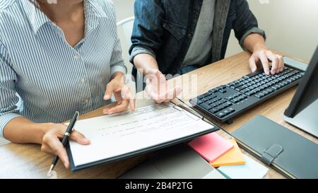 Collaborative work Software engineers website developer technologies or programmer working coding on startup ai application project on screen with par Stock Photo