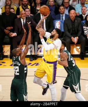 Los Angeles, California, USA. 6th Mar, 2020. Los Angeles Lakers' Anthony Davis (3) shoots against Milwaukee Bucks' Khris Middleton )22) during an NBA basketball game between Los Angeles Lakers and Milwaukee Bucks, Friday, March 6, 2020, in Los Angeles. Credit: Ringo Chiu/ZUMA Wire/Alamy Live News Stock Photo
