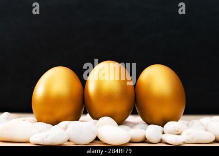 Golden Easter egg, happy Easter sunday hunt holiday decorations Stock Photo