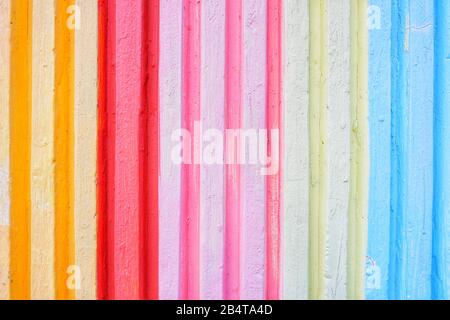 Vivid multicolored vertical pattern textured abstract background. Colourful of painted cement wall backdrop. With space for text, word, or product Stock Photo