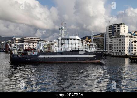 Ocean research vessel Kristine Bonnevie departing from the port of Bergen, Norway. Owned by the University of Bergen, Institute of Marine Research. Stock Photo