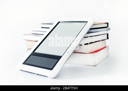 E-book reader in pink case on white background Stock Photo