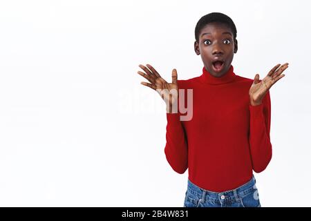 Excited girl having wonderful day and buying new clothes Stock