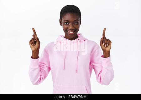Portrait of sassy attractive african-american blond man, winking and  showing okay gesture in approval, standing white background Stock Photo -  Alamy