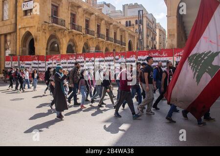 Beirut, Lebanon. 7 March 2020:  Anti government protesters march in downtown Beirut  as they campaign against government. corruption and economic paralysis . Lebanon is facing economic and financial strains, sparking protests  against a ruling elite accused of plunging the country into crisis Credit: amer ghazzal/Alamy Live News Stock Photo