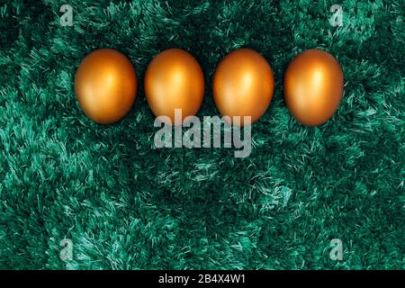 Golden Easter egg, happy Easter sunday hunt holiday decorations Stock Photo