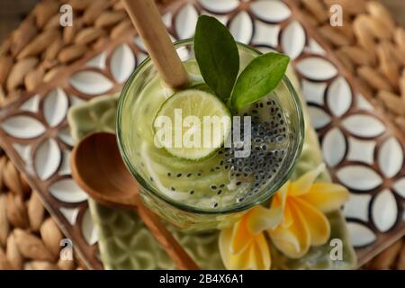 Es Kuwut. A Balinese fruit cocktail of honeydew melon, coconut and basil seeds. Stock Photo
