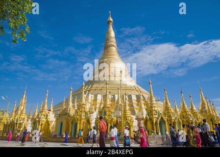 YANGON, MYANMAR - DECEMBER 17, 2016: View of the golden stupa of the Shwedagon Pagoda on a sunny day Stock Photo