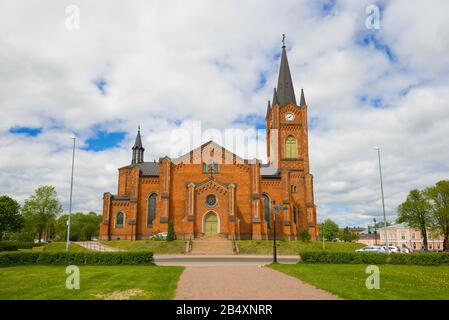 View of the old Lutheran church of the city of Loviisa on a cloudy June day. Finland Stock Photo