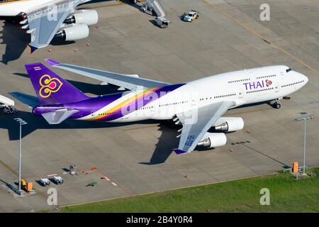 Thai Airways International Boeing 747 parked at Sydney Airport in Australia registered as HS-TGF.  747-400 aircraft before flight to Bangkok, Thailand Stock Photo