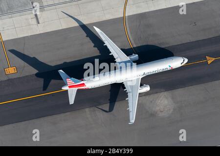 Aerial view of American Airlines Airbus A321 N110AN taxiing at an international airport. Narrowbody aircraft used for domestic flights. Stock Photo