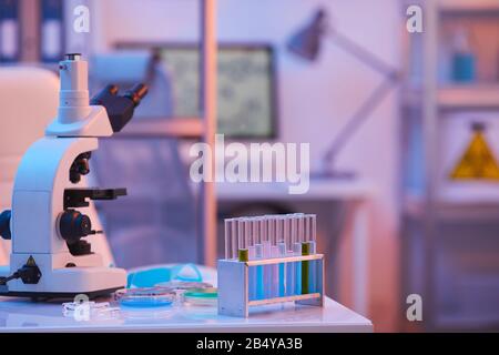 Horizontal no people shot of modern medical laboratory room with equipment interior in purple light Stock Photo