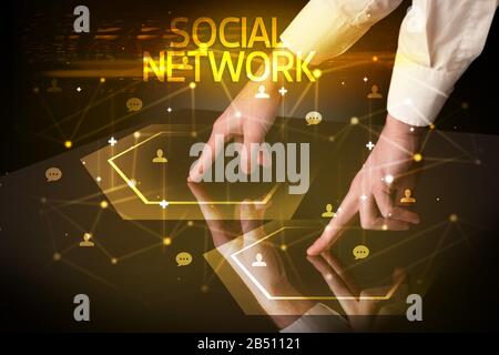 Navigating social networking with SOCIAL NETWORK inscription, new media concept Stock Photo
