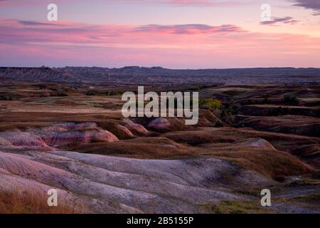 SD00324-00....South Dakota - Sunset viewed from the Badlands Wilderness Overlook in Badlands National Park. Stock Photo