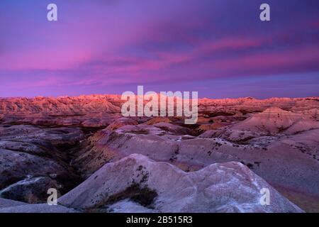 SD00329-00...SOUTH DAKOTA - Unbelievable colors and an unbelievable landscape viewed at dawn from Yellow Mounds Overlook in Badlands National Park. Stock Photo