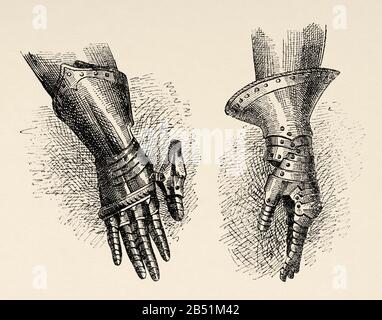 Gauntlet or mitten, were part of the armor worn by the knights of medieval times. They were metal gloves that they used to protect their fingers, hand Stock Photo