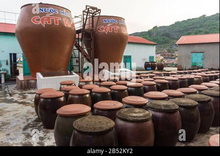 DSC02029 Cat Ba island, Vietnam Oct 17, 2019. Big jars in production of fish sauce in Vietnam. Factory fish sauce production facilities on Cat Ba isla Stock Photo