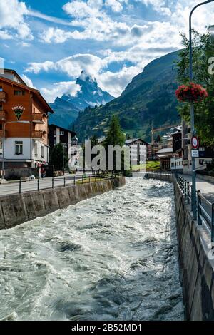 Mattervispa flows from the Gornergletscher through Zermatt towards Visp as here at the west end of Zermatt in Switzerland Stock Photo