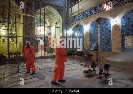 Iranian health ministry staff, the provincial fire department and municipal staffs are disinfecting public places to prevent Coronavirus(COVID19) at late night using machinery and mobile pumps at Historical urban context and alleys of Shiraz city, Fars province, Iran. Schools, Sport cpmplex, Concerts and all social gatherings have been canceled in Iran.