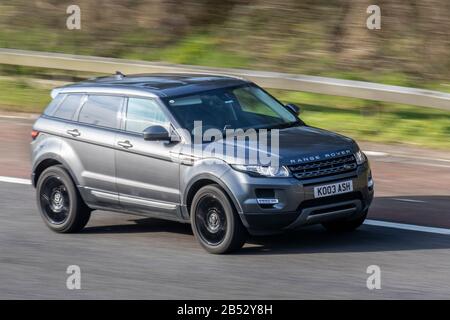 2005 Grey Land Rover Range Rover Evoque Pure T with private number plate, personalised, cherished, dateless, DVLA registration marks, registrations; UK Vehicular traffic, road transport, modern vehicles, saloon cars, vehicle driving, roads & motors, motoring on the M6 motorway highway Stock Photo