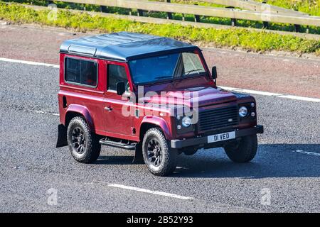 2015 Land Rover Defender 90 Xs Td 2.2 Tdci Red LCV Hardtop Van Diesel 2198 cc with private number plate, personalised, cherished, dateless, DVLA registration marks, registrations, road transport, modern vehicles, saloon cars, vehicle driving, roads & motors, window van motoring on the M6 motorway highway, UK Stock Photo