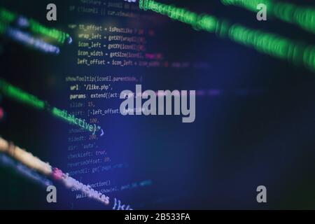 HTML5 in editor for website development. Website HTML Code on the Laptop Display Closeup Photo. Stock Photo