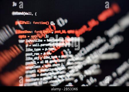 Modern tech. PHP syntax highlighted. Writing programming functions on laptop. Big data and Internet of things trend. Stock Photo