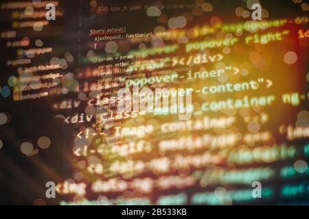 Future technology creation process. Coding script text on screen ...