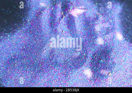Multi-colored powder sprayed on black backgrounds Stock Photo