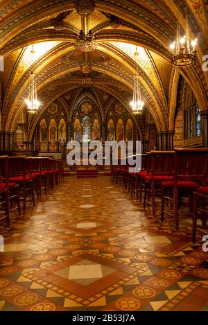 The Chapel of St Mary Undercroft with its highly decorated vaulted ceiling at the Palace of Westminster, London, England Stock Photo