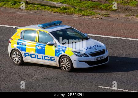 2017 Peugeot 308 Access SW Blue HDI S; UK Motorway Police Vehicular traffic, transport, modern vehicles, saloon cars, vehicles, vehicle, uk roads, motors, motoring south-bound on the 3 lane M61 motorway highway Stock Photo