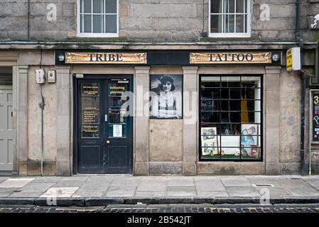 Tribe Tattoo shop on  West Nicolson Street, Edinburgh, Scotland, UK. Stock Photo