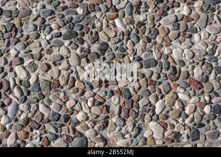 Pavement pebble pathway pattern texture background, old style stone sidewalk Stock Photo