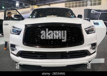 Philadelphia, Pennsylvania, U.S.A - February 10, 2020 - The front view of the white color 2020 Infiniti QX80 full-size luxury SUV Stock Photo