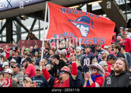 Houston, TX, USA. 7th Mar, 2020. Houston Roughnecks fans celebrate during the 4th quarter of an XFL football game between the Seattle Dragons and the Houston Roughnecks at TDECU Stadium in Houston, TX. Houston won the game 32 to 23.Trask Smith/CSM/Alamy Live News Stock Photo