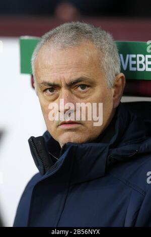 Tottenham Hotspur Manager Jose Mourinho looks on from the dugout. Premier League match, Burnley v Tottenham Hotspur at Turf Moor in Burnley, Lancashire on Saturday 7th March 2020.  this image may only be used for Editorial purposes. Editorial use only, license required for commercial use. No use in betting, games or a single club/league/player publications. pic by Chris Stading/Andrew Orchard sports photography/Alamy Live news Stock Photo