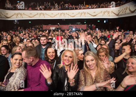 London, UK. 7th March 2020.  Polish crowd during the concert. Disco polo is a genre of popular dance music, created in Poland. Annually in the O2 Shepherds Bush Empire, fans of Disco Polo Music gather to see the most popular Polish bands. Credit: Marcin Nowak/Alamy Live News Stock Photo