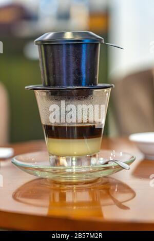 Vietnamese Coffee Condensed Milk Glass Cups Traditional Metal Coffee Maker  Stock Photo by ©Ikarahma 557022310