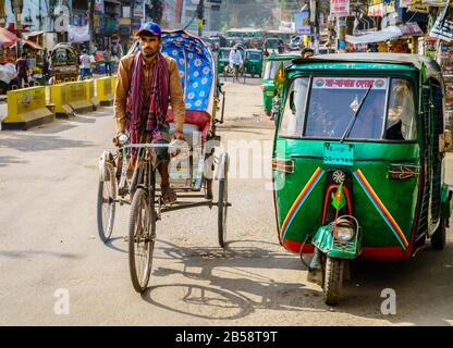 Chittagong, Bangladesh, December 22, 2017: typical steet life with rickshaw traffic  in Chittagong, Bangladesh Stock Photo