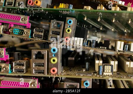 close up, old electronic motherboards from computers are lying in a pile Stock Photo