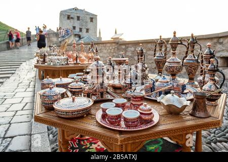 Decorative souvenirs and handicrafts for sale on the Stari Most bridge in Old Town of Mostar BiH Stock Photo