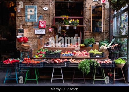 Farmers market with organic fruits and vegetables in Szimpla Garden ruin bar in Budapest, Hungary Stock Photo