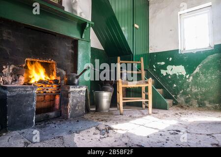 Traditional working class kitchen hearth in the Ulster Folk Museum, Northern Ireland. Stock Photo