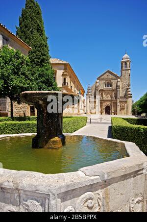 The Sacred Chapel of El Salvador (Capilla del Salvador) and the Plaza de Vazquez de Molina with fountain in foreground, Ubeda, Spain. Stock Photo