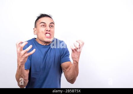 hysterical man White background, medium shot Stock Photo