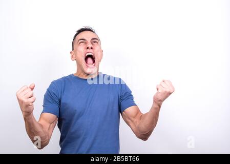 hysterical man White background, medium shot Stock Photo