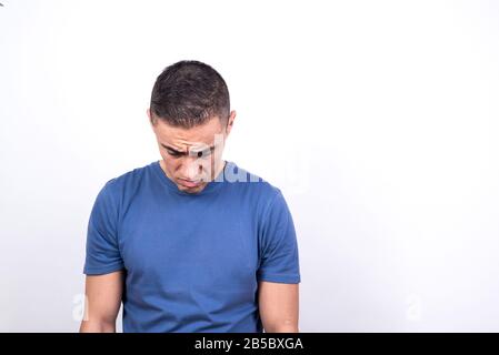 Sad man. White background, Medium shot Stock Photo