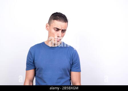 Sad man. White background, Medium shot Stock Photo