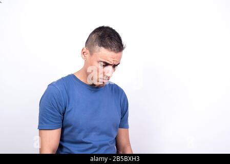 Sad man. White background, Medium shot Stock Photo